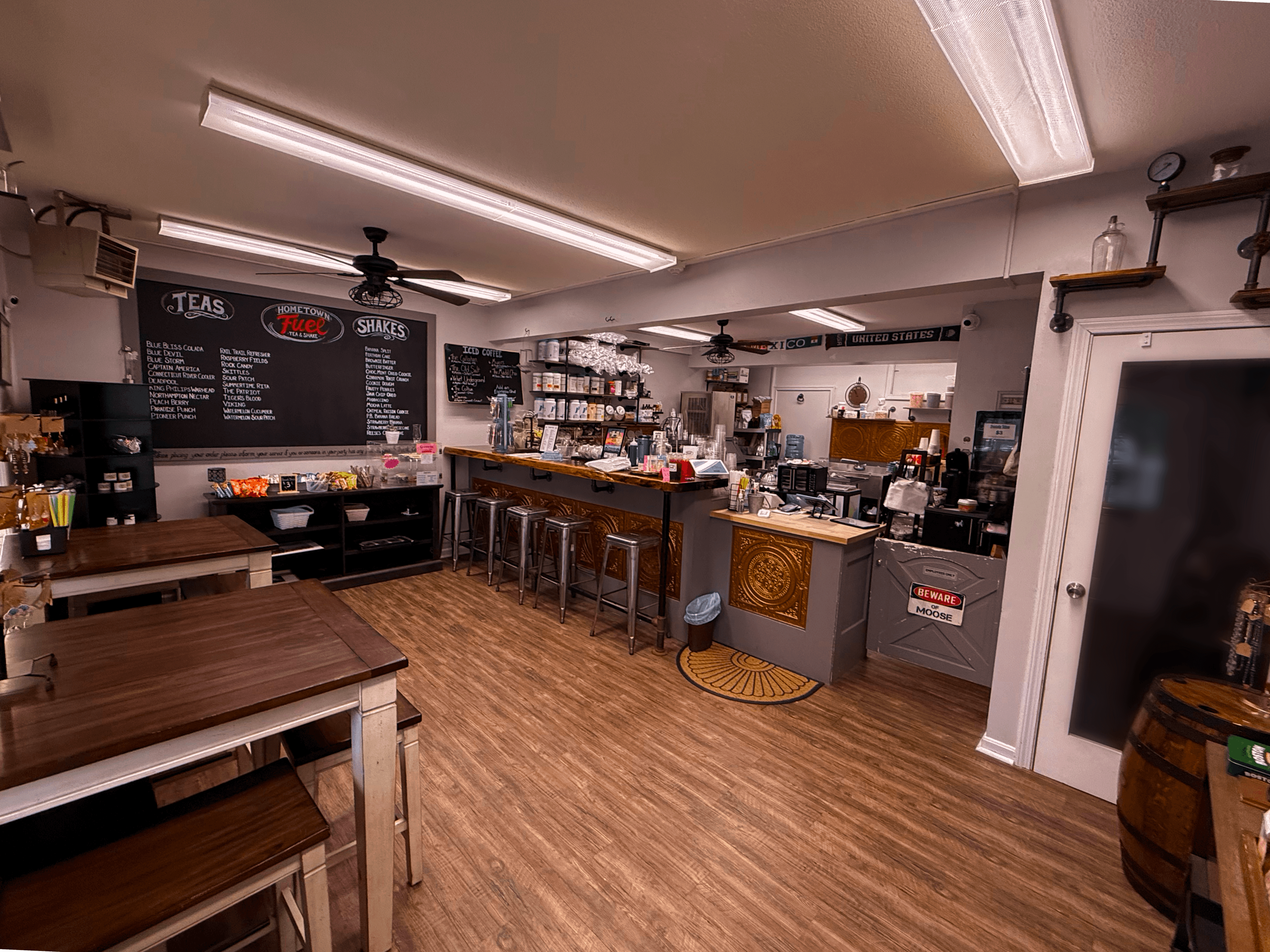 The inside of Hometown Fuel, with its tea and shake menu wall